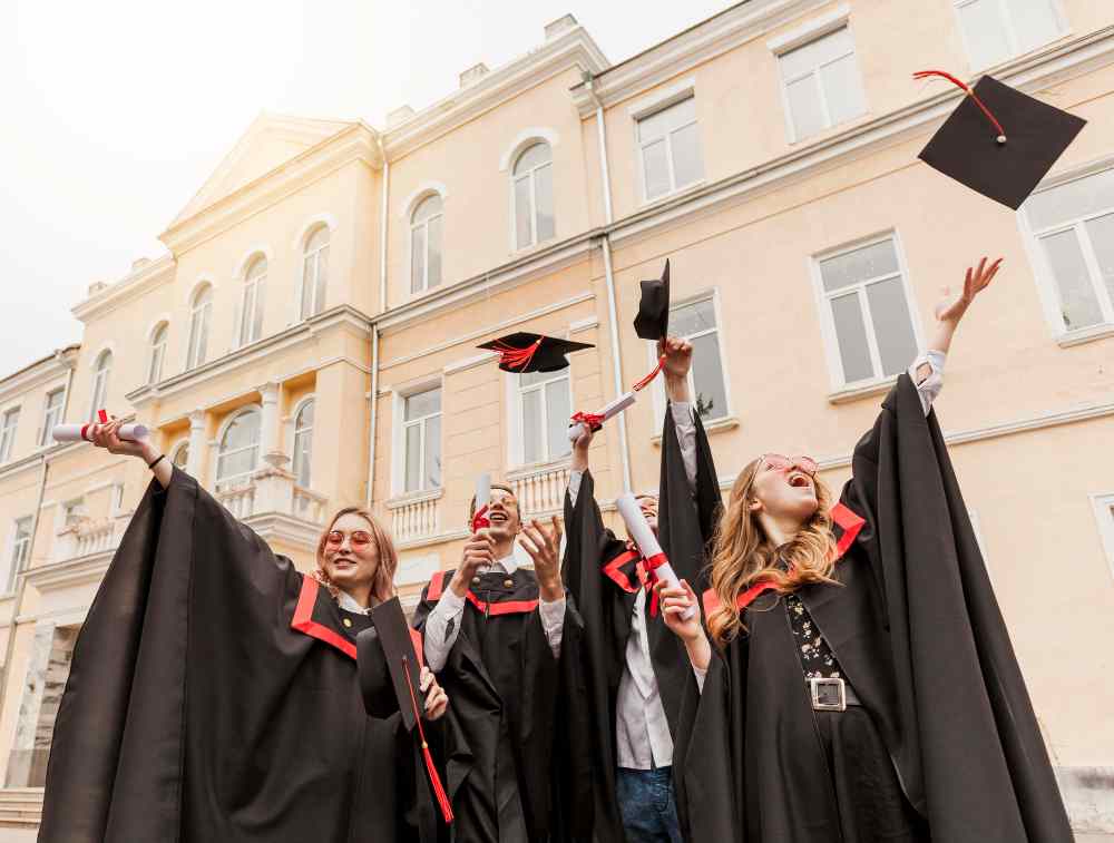 University students celebrating graduation